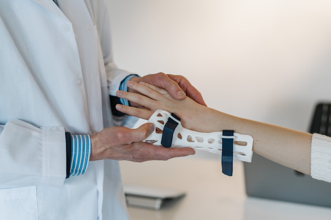 TCM physician performing gentle pulse diagnosis during consultation