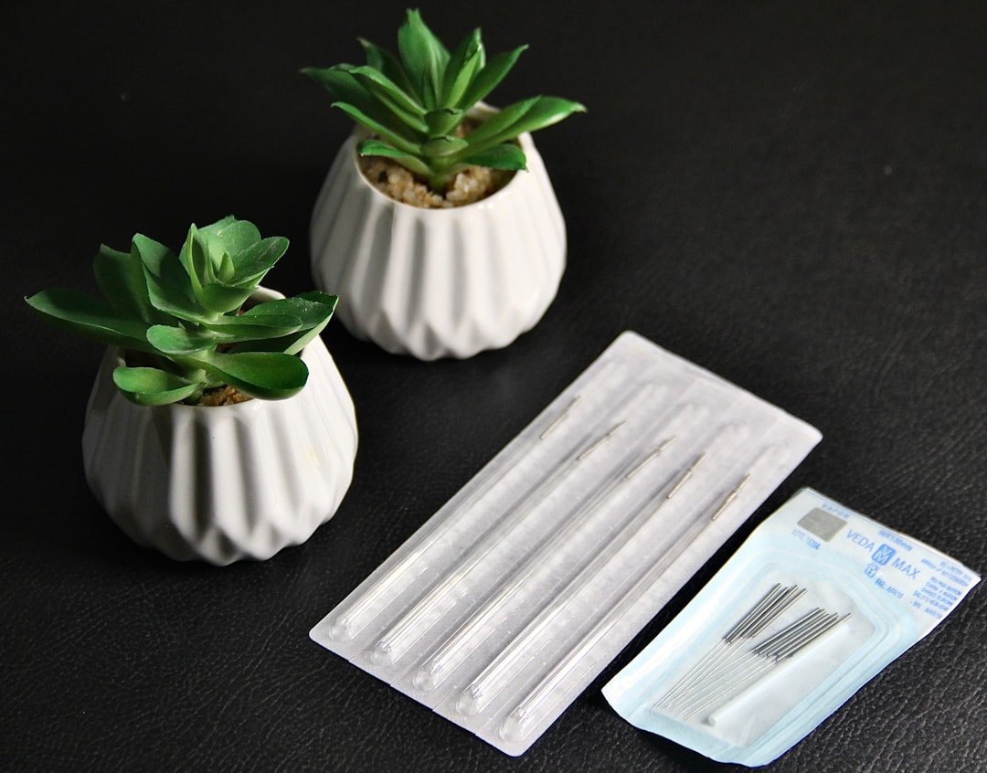 Sterile acupuncture needles and herbal supplies showing clinic safety standards